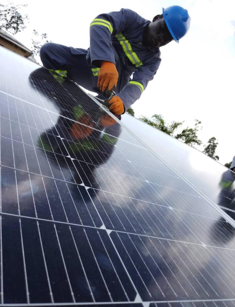 Solar Bright Future team installing solar panels